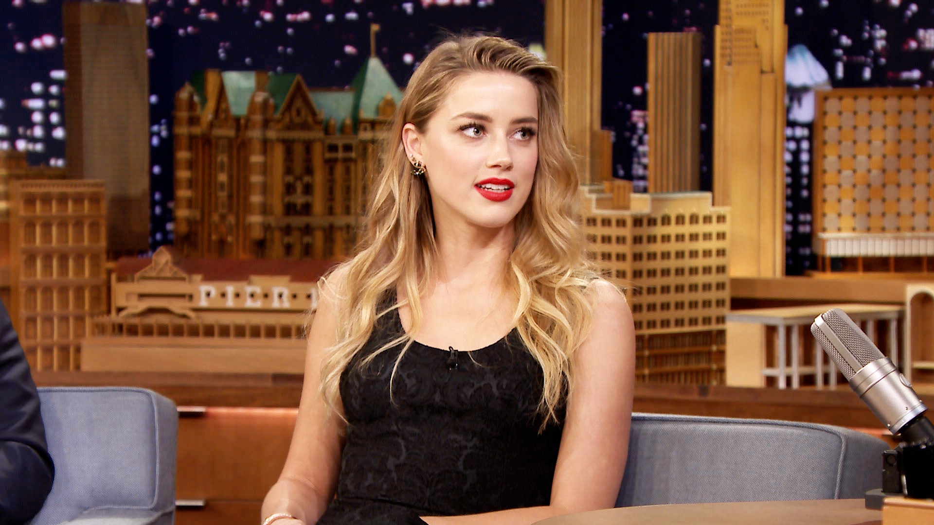 Amber Heard Said Johnny Depp Hit Her For Laughing At His Tattoo In Her  First Testimony - Narcity