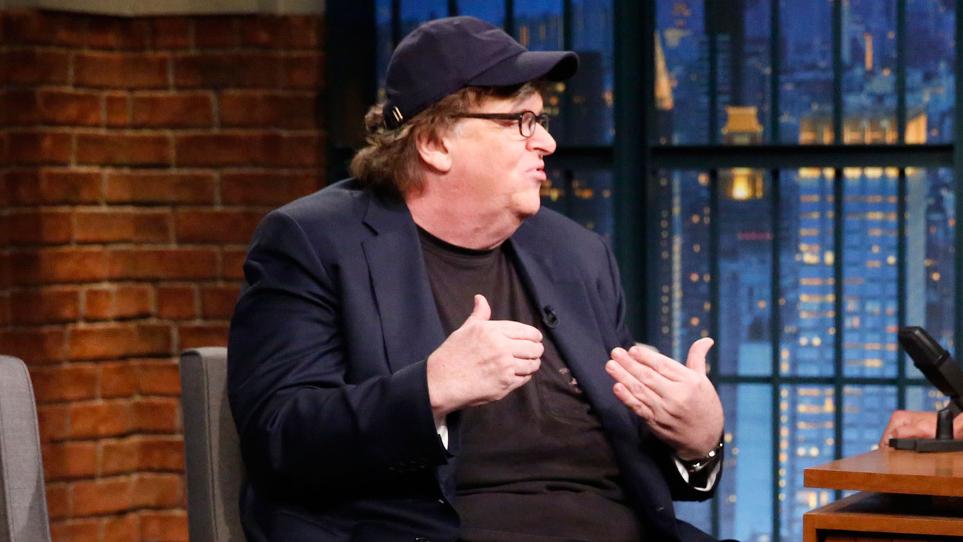 Watch Late Night with Seth Meyers Interview Michael Moore on Giving