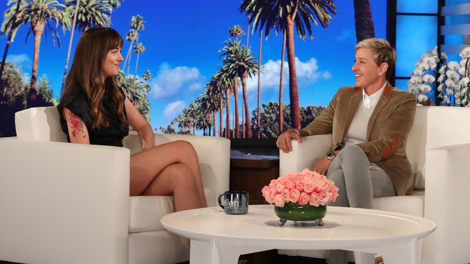 Watch Access Hollywood Interview Dakota Johnson Shoots Down Rumors That Shes Pregnant With 