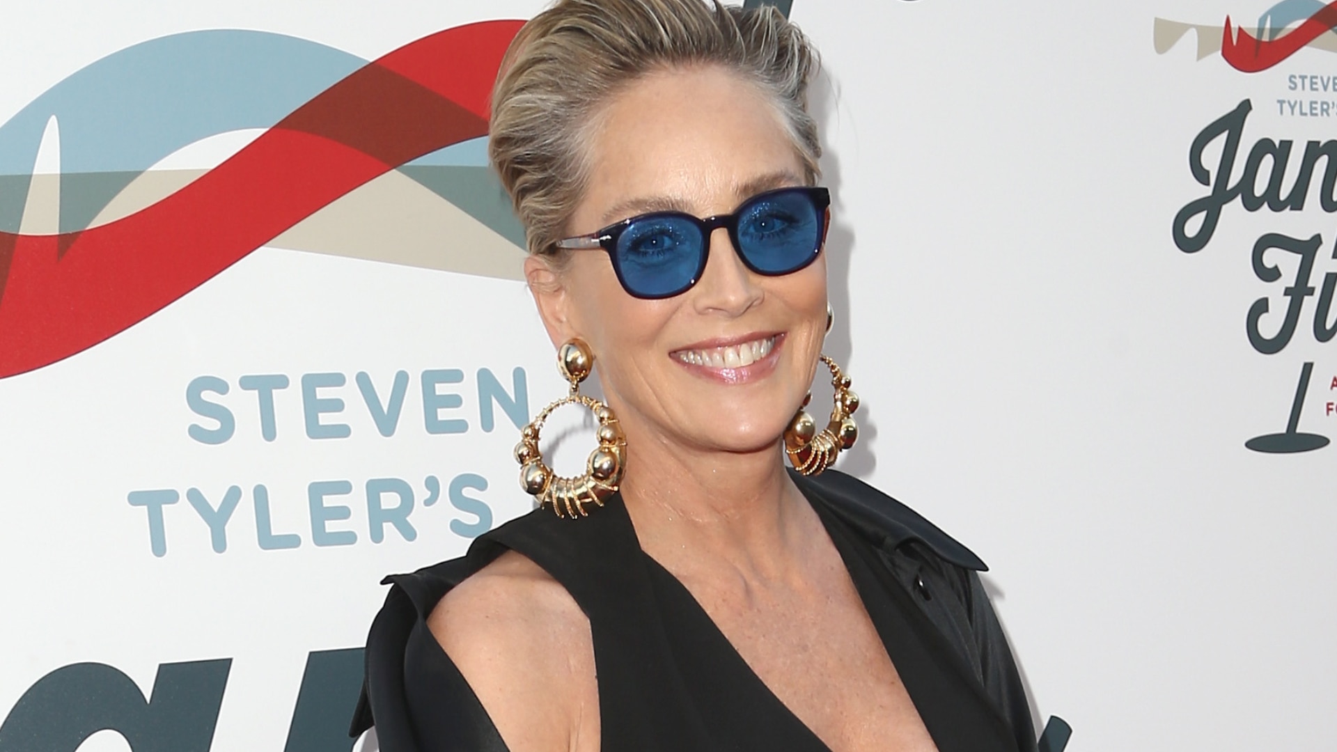 Watch Access Hollywood Interview Sharon Stone Poses Topless For Super