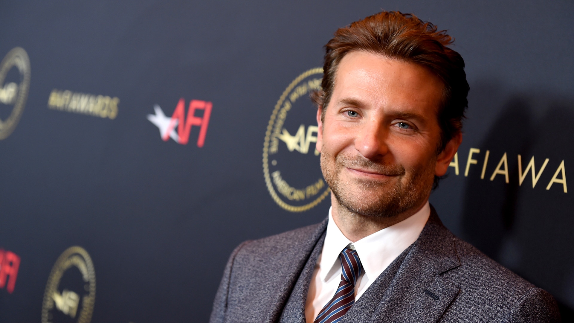 Bradley Cooper Reveals His Shaved Head While on a Phone Call in N.Y.C.