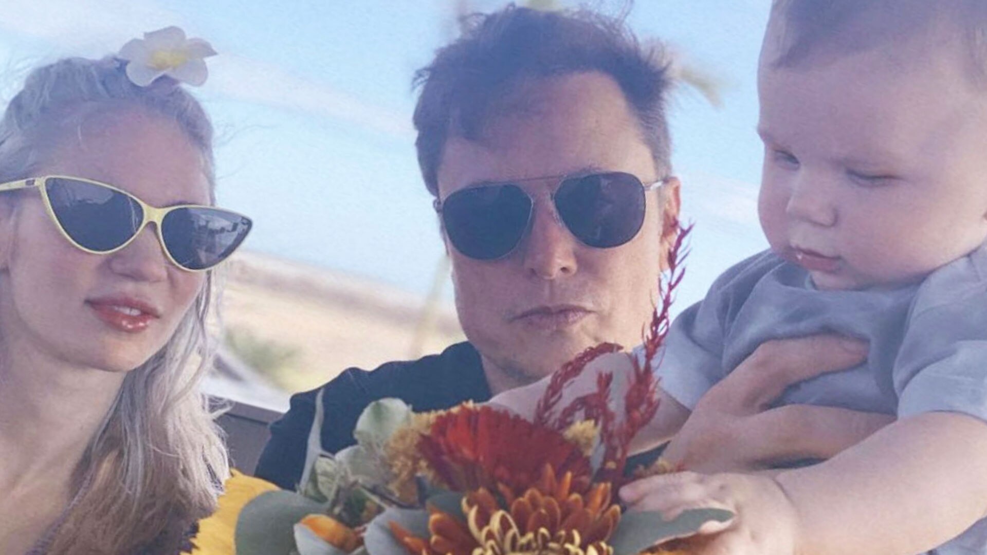 Watch Access Hollywood Interview: Elon Musk &amp; Grimes Pose For Rare Family Photo With Son X Æ A