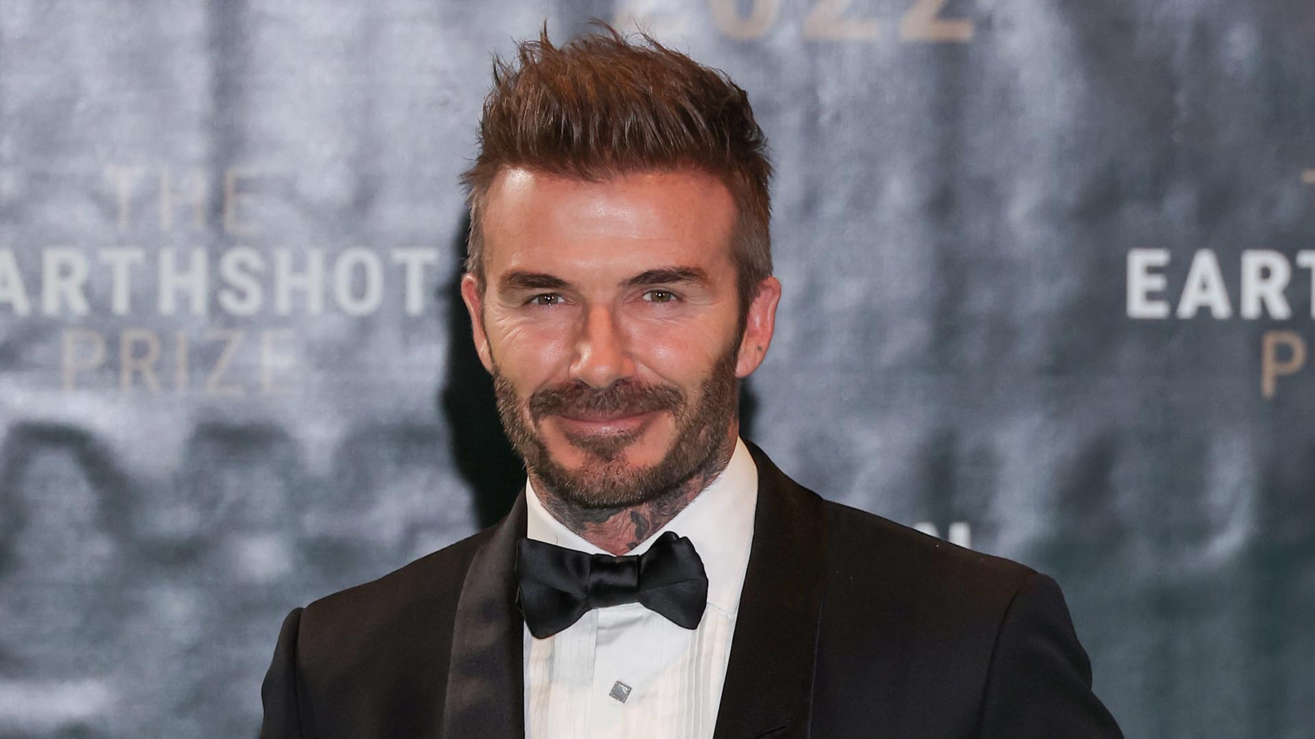 Watch Access Hollywood Highlight: David Beckham Changes Tire In Stylish ...