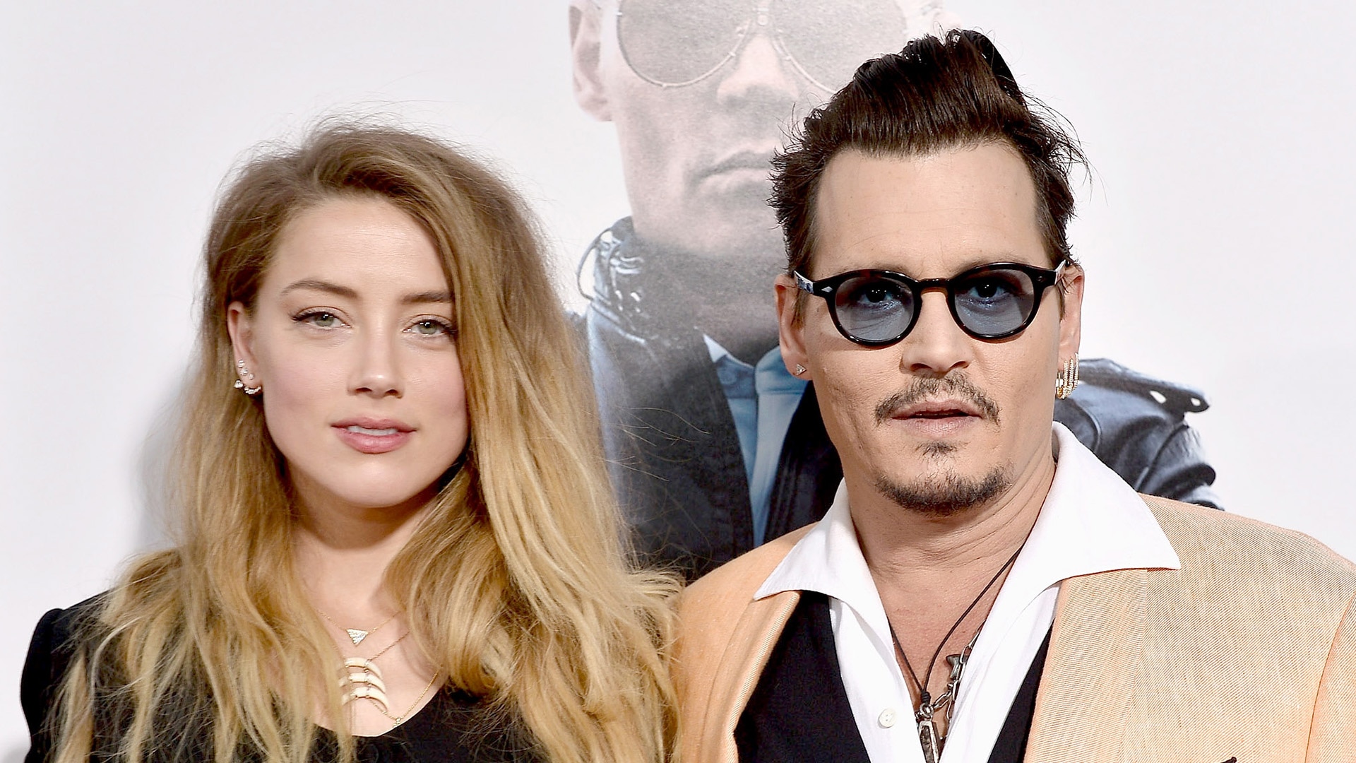 Watch Access Hollywood Highlight Amber Heard Officially Files To